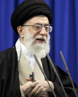khamenei03 Here is the REAL leader of Iran. The Supreme Leader himself, Ayatollah Ali Khamenei. Like all great religious men, he is delivering this sermon whilst fondling the muzzle of a rifle. I sure hope Barry's message of hope and change gets through to him!