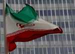 FILE PHOTO: An Iranian flag flutters in front of the IAEA headquarters in&nbsp;Vienna